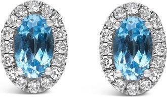 House of Brilliance 10K White Gold 5x3 MM Oval Blue Topaz and Diamond Halo Stud Earrings (I-J Color, I1-I2 Clarity)
