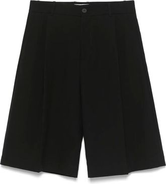 STUDIO NICHOLSON Shorts a gamba ampia con pieghe - Nero