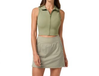 Travis Mathew Moveknit Rib Zip Polo In Oil Green
