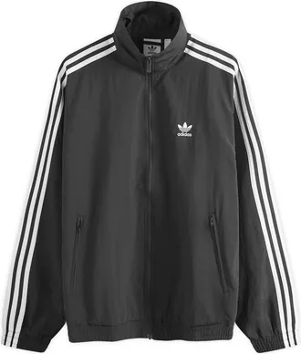 Adidas x uo track windbreaker jacket best sale