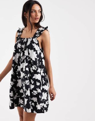 Levi's Meg - Vestito corto stile babydoll nero con stampa a fiori