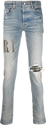 Amiri logo-print distressed skinny jeans - men - Cotton/Polyester/Spandex/Elastane/Lamb Skin - 38 - Blue