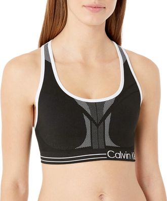 Calvin Klein Womens Medium Impact Reversible Sports Bra (Standard and Plus Sizing), Black/White, XS