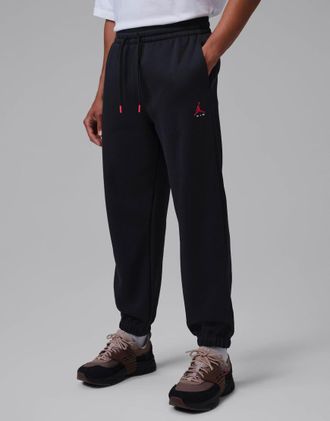 Nike Jordan Brooklyn pantaloni in fleece con fondo elasticizzato neri-Nero