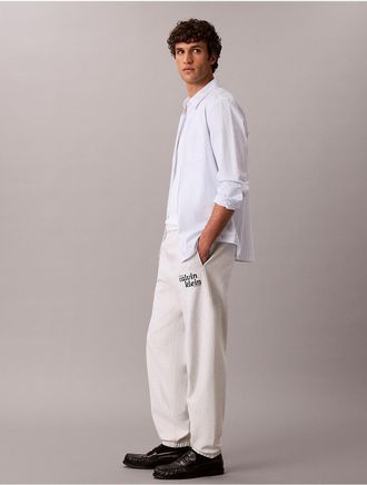 Calvin Klein Jeans Calvin Klein Mens Terry 1989 Logo Graphic Joggers - Light/Pastel Grey - XL