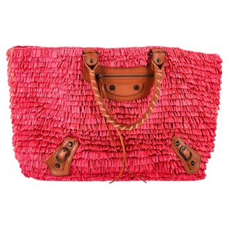 Balenciaga Balenciaga geweven mandtas in roze raffia