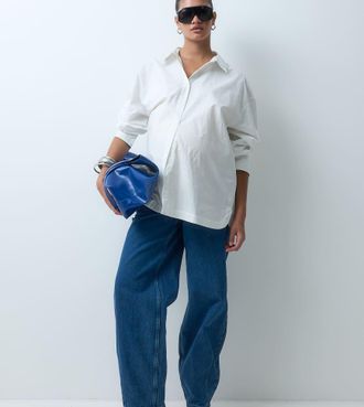 Mama Licious MAMALICIOUS jeans premaman sotto il pancione a gamba bombata in denim blu medio