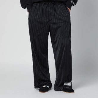 Yohji Yamamoto Pantaloni jogging neri con motivo gessato
