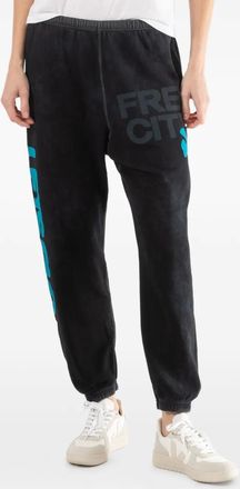 Freecity graphic-print track pants - Black
