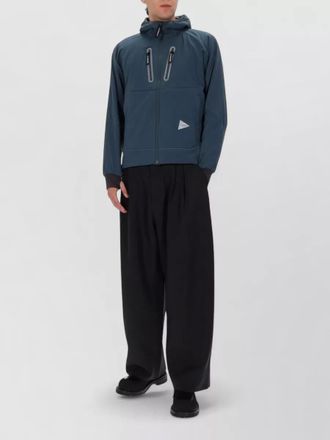 And Wander hooded jacket featuring zip pockets