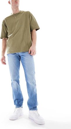 Wrangler Texas slim fit lightweight jeans in light wash-Blue