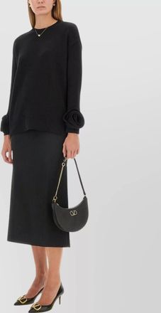 Valentino knitwear with dropped shoulders and floral appliqué