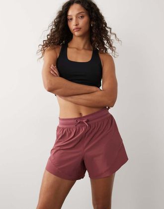 Sweaty Betty Runners - Pantaloncini ampi rosa a vita alta
