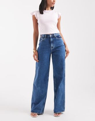 Tommy Jeans Claire - Jeans ampi a vita alta lavaggio medio con fiori ricamati-Blu