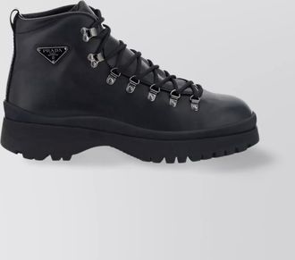 Prada chunky sole leather ankle boots with triangle detail