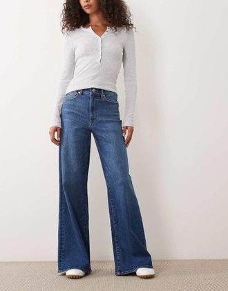 Good American Good Waist - Jeans stile palazzo lavaggio blu medio