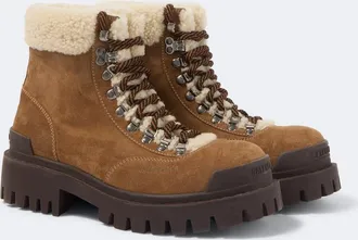 Balenciaga Shearling-lined suede lace-up boots