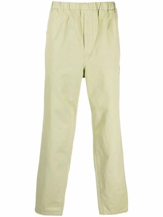 Undercover logo-patch trousers - Green