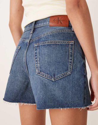 Calvin Klein Jeans Pantaloncini in denim stile anni 90 blu lavaggio medio