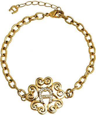 Aigner Gold Tone Crystal Logo Bracelet