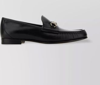 Gucci leather loafers featuring metallic detail