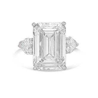 Diana M. Jewels Platinum Lab grown 15ct Emerald diamond ring with heart diamonds on the side and micropave band