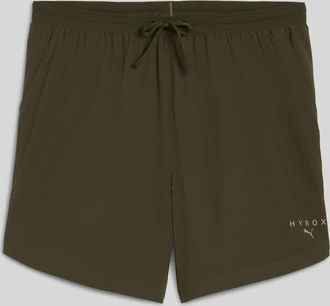 Puma PUMA x HYROX - Regular Fit Sport-Shorts aus ultraleichtem Material in Oliv, Gr&ouml;&szlig;e XL