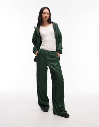 Nike Pantaloni dritti verde scuro con cintura