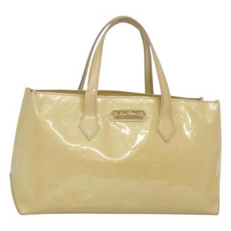 Louis Vuitton Tweedehands leren Louis Vuitton tassen - Dames - Pre-owned - Beige - Maat: ONE Size Leer