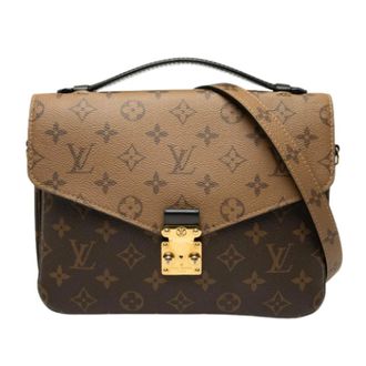 Louis Vuitton Pre-owned Pochette Metis - Dames - Pre-owned - Bruin - Maat: ONE Size Zijde