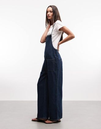 Monki Olga - Salopette in denim lavaggio blu