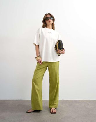 Topshop Pantaloni dritti in lino color verde medio con fondo ampio