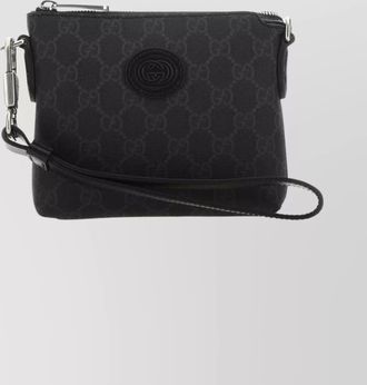 Gucci supreme fabric clutch featuring wrist strap