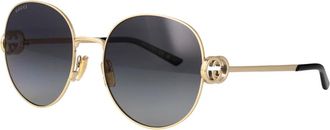 Gucci Interlocking GG Zonnebril met rond montuur - unisex - Accessoires - Geel - Maat: 58 MM