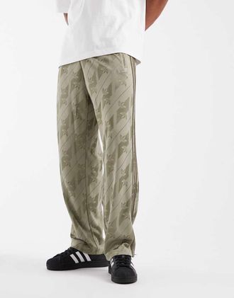 adidas Originals pantaloni della tuta Firebird con monogramma kaki-Verde