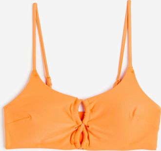 H&M Wattiertes Bikinitop - Orange
