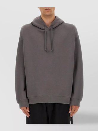 Yohji Yamamoto hoodie featuring graphic design on back