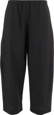 Khaite Virgin Wool Trousers with a Loose Fit - female - Khaite - Wide Trousers - Black - L - Trousers