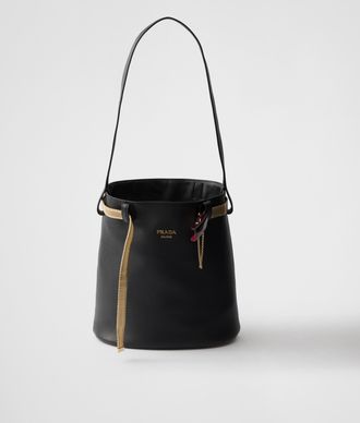 Prada Buckle leather bucket bag with jeweled belt