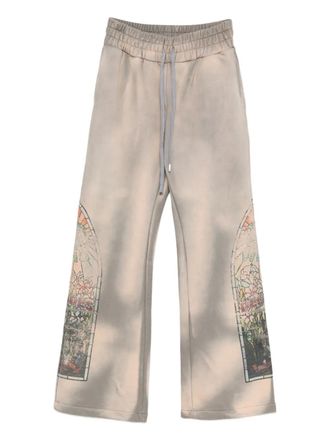 Who Decides War by Ev Bravado graphic-print track pants - men - Cotton - 30 - Neutrals