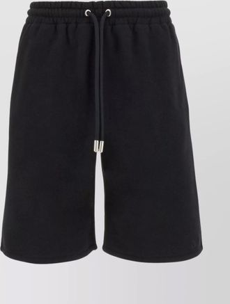 Off-white cotton bermuda shorts with seam and patch pockets