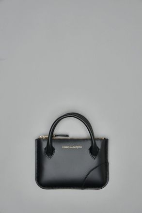 Comme Des Gar&ccedil;ons Handles