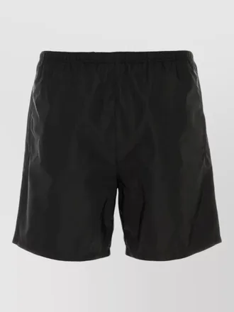 Prada re nylon swimming shorts featuring back pocket