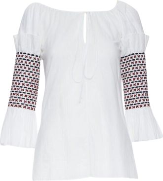 Rosie Assoulin ethnic embroidery smocked sleeves off shoulder top