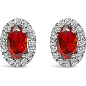 House of Brilliance 10K White Gold 5x3 MM Oval Cut Birthstone and Diamond Halo Stud Earrings in Red Garnet at Nordstrom