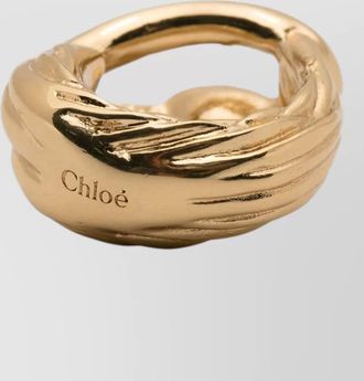 Chlo&eacute; twisted design rings gold tone polished