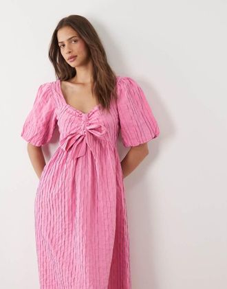 Vero Moda Vestito midi testurizzato rosa con fiocco sul davanti e maniche a sbuffo