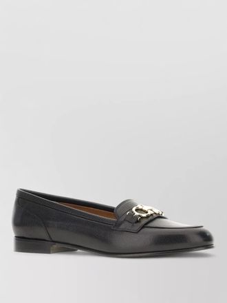 Ferragamo bax loafers featuring gold tone hardware