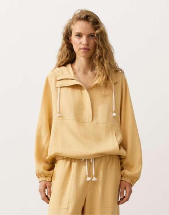 Oysho Felpa con lyocell e 24% di lino gialla con zip corta e tasca sul davanti-Giallo