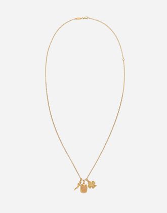 Dolce & Gabbana Devotion Yellow And Red Gold Rounded Rectangular Pendant With A Red Gold Virgin Mary Medallion, Horn And Four-leaf Clover Pendants On Yellow Gold Chai